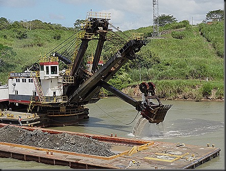 Dredging canal for larger ships from new canal (2)
